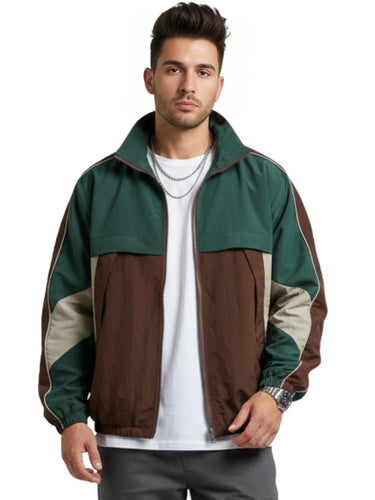 Man wearing a green and brown jacket on a white background